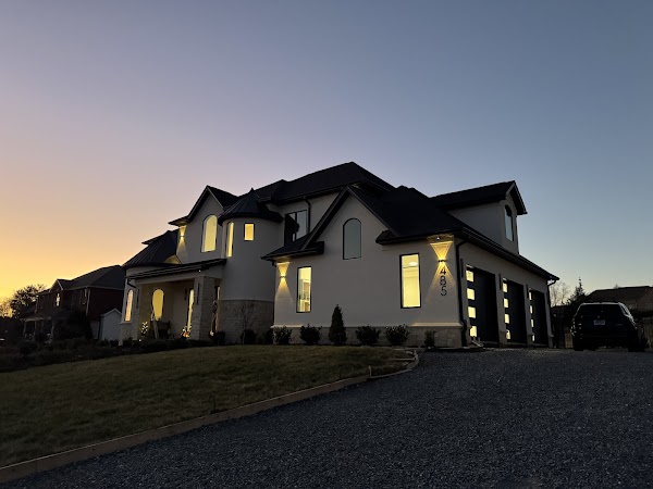 Beautiful modern home at dusk with clean exterior