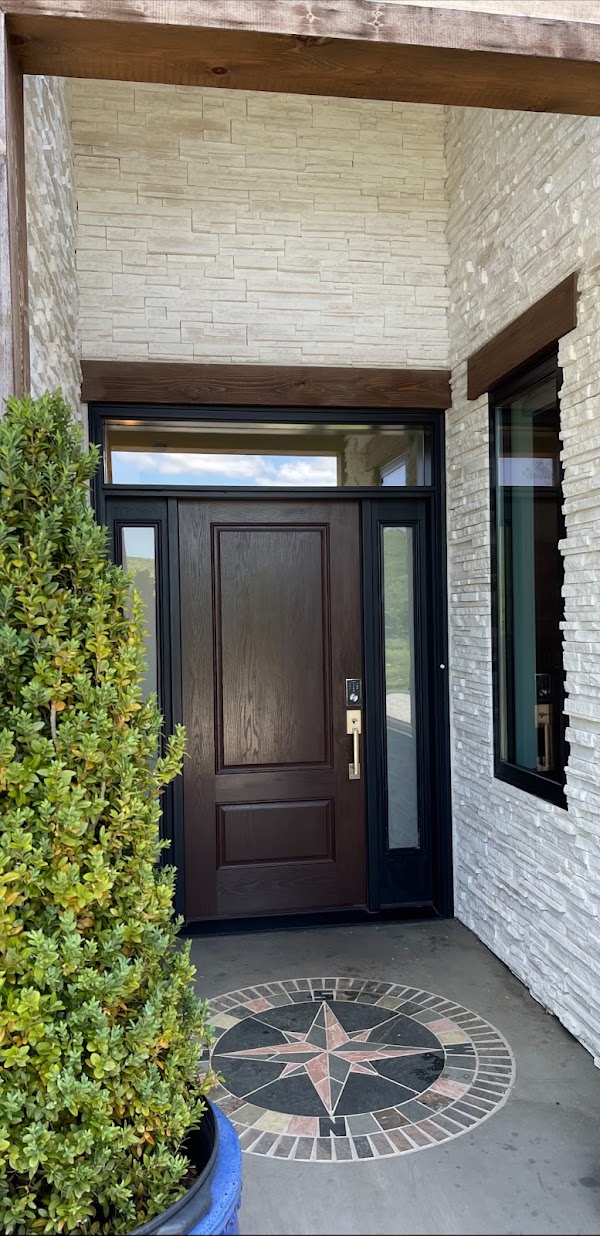 Pristine stone facade home entrance after exterior cleaning